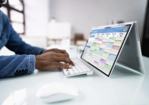 man online managing his business calendar software